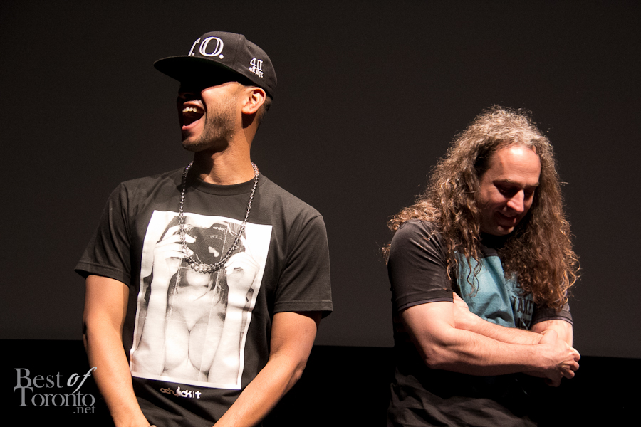 Director X and Francois Lamoureux laughing on stage