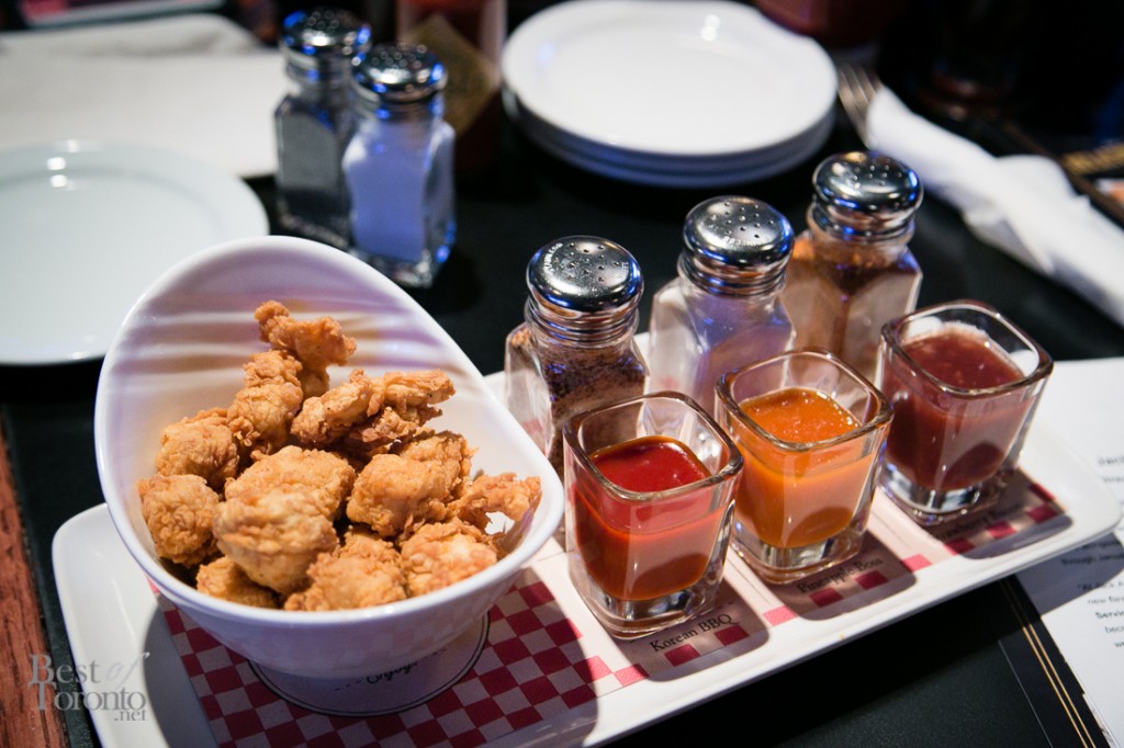 Cluckin’ Chicken Dippers served with unique salts and dipping sauces