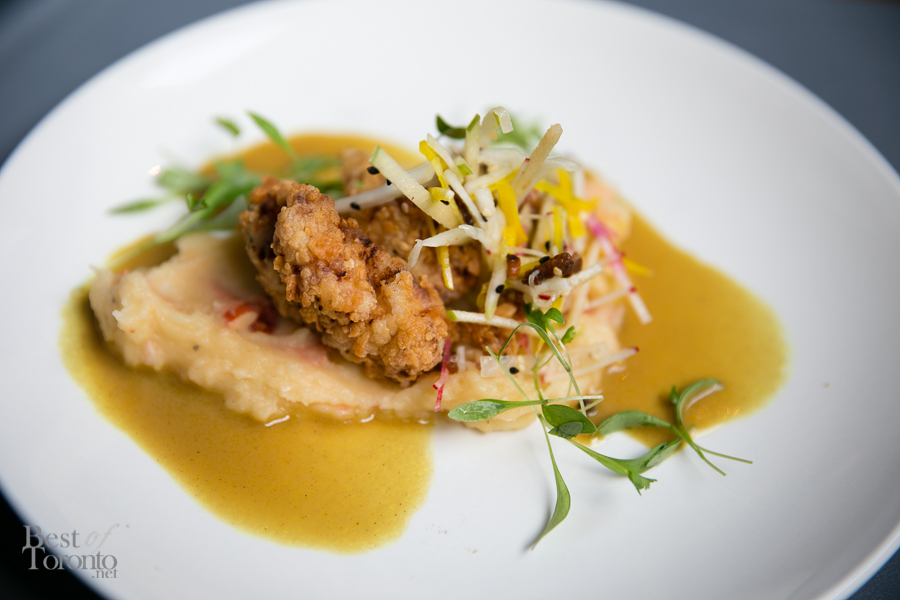 "Lime Leaf-Sesame Fried Chicken" with Lobster mash, Khao Soy curry, bacon-apple heirloom beet slaw