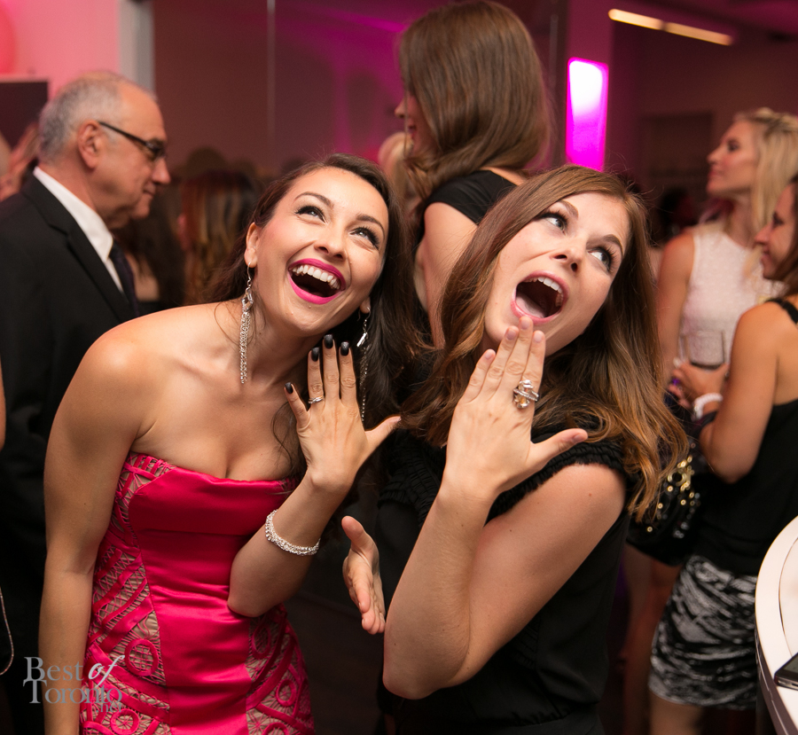 Actresses Ann Pirvu and Meghan Heffern making faces at Eligible Magazine's TIFF Bachelor Party 2014