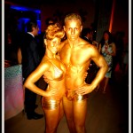 Models covered in gold