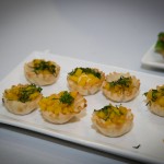 Phyllo cup, minted chickpeas and saffron potato crisp basil toast, brie cheese and oven-dried tomato and apple jam by Destingo