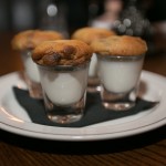 Ending the meal with milk topped with a chocolate chip cookie