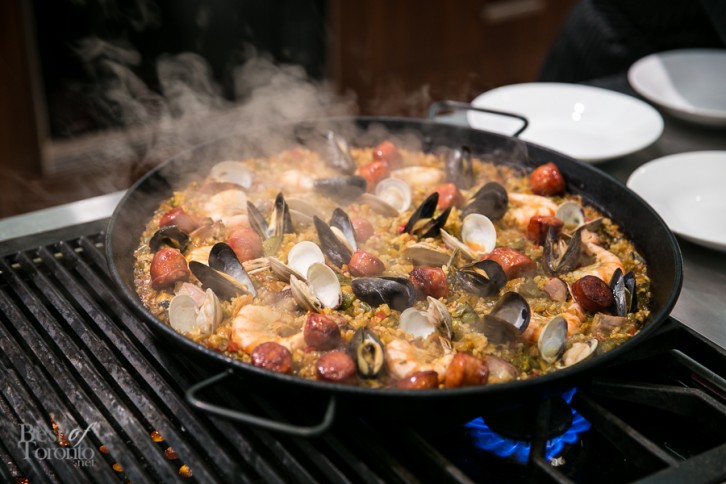 Valencian Spanish paella with baby clam, mussel, calamari, shrimp, chicken and grilled chorizo
