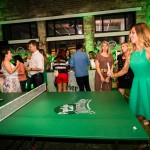 Playing ping pong with one of the Perrier girls