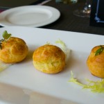 gougère - a choux pastry filled with goat cheese mousse infused with herb garlic and lemon