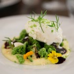 Spring Garden dessert with sour cream ice cream, cilantro, olive caramel, edible flowers and more.