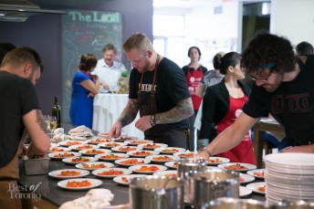 Chef Derek Dammann preparing Raw Sockeye Salmon & Tomato Vinaigrette