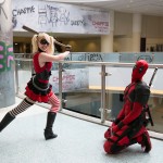 Harley Quinn and Deadpool playing T-ball
