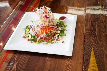 Signature slaw: 19-ingredient Singaporean slaw with a salted plum dressing.