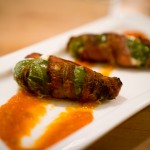 Smoked Bacon Wrapped Jalapeños Stuffed with Aged Cheddar and Tomato Dip | Photo: John Tan