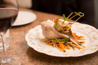"Chef's Braised Whelk" with sliced shellfish lightly grilled and bathed in a kombu seaweed beurre blanc served on sea asparagus and burdock salad