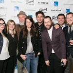 JUNO Award winners Fred Penner and Max Kerman (The Arkells) taking a group photo with guests at the Gibson Guitar party