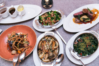 A quick shot of some of the many shared plates | Photo: Nick Lee