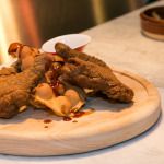 "General Sanders' Chicken" with kung pao sauce, sichuan maple syrup, HK egg waffles