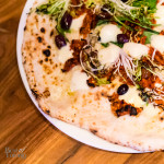 Scarola e pomodorini | White pizza with fresh basil, escarole, black olives, sundried tomatoes, fire di latte and EVOO D.O.P.